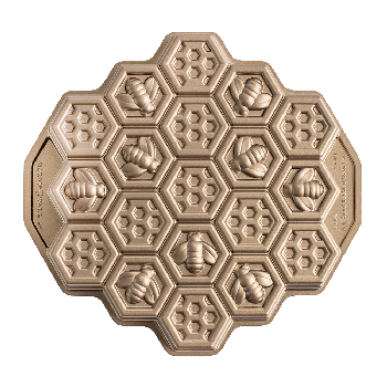 A cake pan with a honeycomb bee pattern