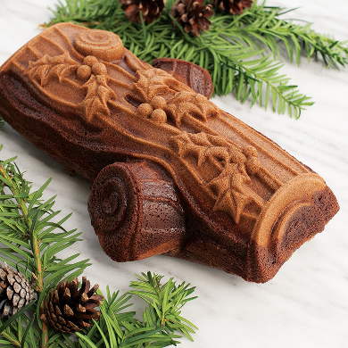 Promotional image of a baked yule log cake